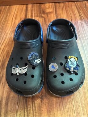 CROCS Kids Black Foam Clogs with Blue Trim and Decorative Charms